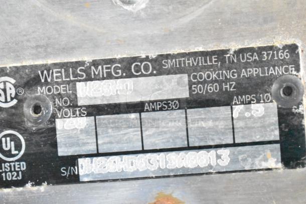 Wells W23HD Commercial Warming Drawer label, displaying model, volts, phase, and serial number details.