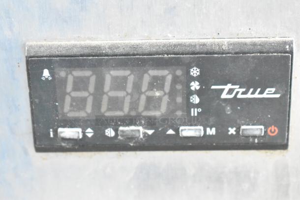 Close-up of the control panel for a 2019 True TRCB-48 Commercial Chef Base, displaying temperature and operational icons.