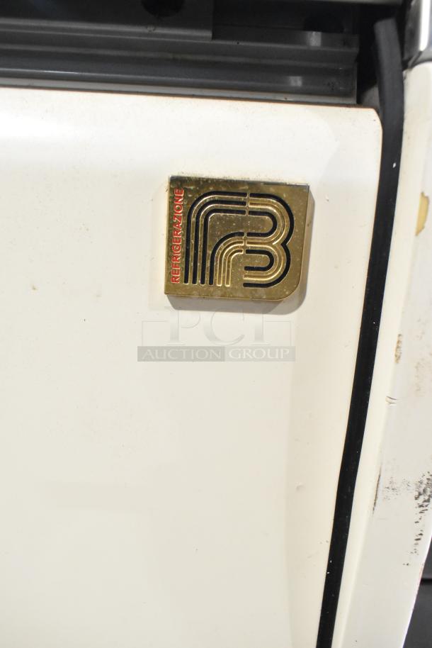 Strike C83F-G12-STL gelato merchandiser in white, features gold label with logo. 220V, 1 phase. Visible wear on the exterior.