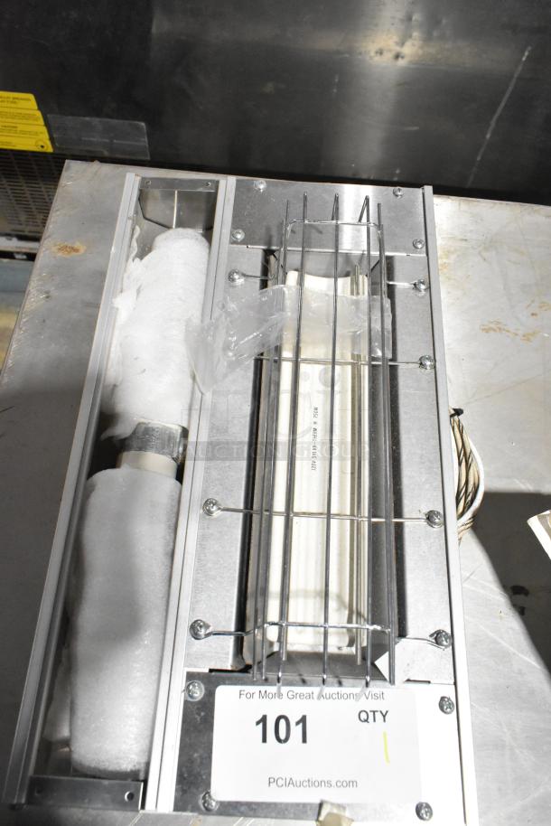 Hatco Commercial Warming Strip, 120 Volts, 1 Phase, stainless steel, protective grill, good condition, auction tag visible.