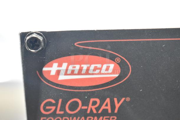 Hatco GRFFB Glo-Ray warming lamp. Close-up of label. 120 Volts, 1 Phase. Red and black colors.