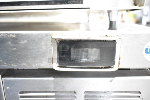 Delfield commercial 2 drawer chef base, visible wear, on commercial casters, digital display, 115 volts, 1 phase.