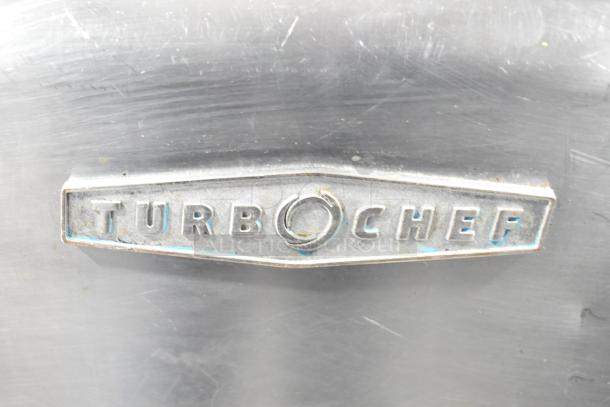 Turbochef HhC2020 commercial rapid cook oven, metal logo on stainless steel surface, 208/240V, 3 phase.