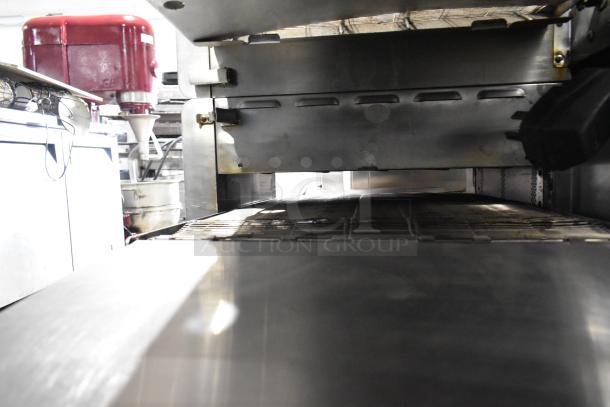 Turbochef HhC2020 commercial electric conveyor rapid cook oven, stainless steel, 208/240V, 3-phase. Shows conveyor interior.