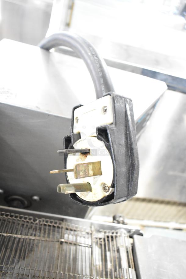 Turbochef HhC2020 commercial electric rapid cook oven plug, 208/240 volts, 3 phase. Durable metal construction.