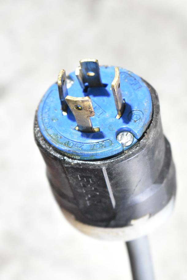 Close-up of a blue and black power plug for the Desmon GBF-15+ETL commercial blast chiller, showing metal prongs.