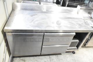 Continental CFB67-BS commercial work top freezer with 2 drawers, 1 door, on casters. Stainless steel, 115V, used condition.