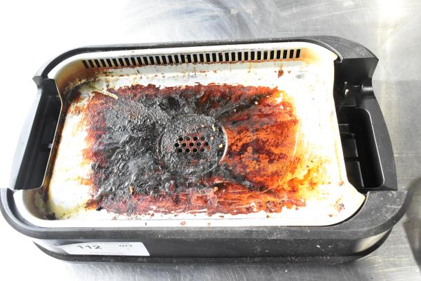 TWRG-200 countertop smokeless grill, used condition, visible grease buildup, 120 Volts, 1 Phase, auction tag 112.