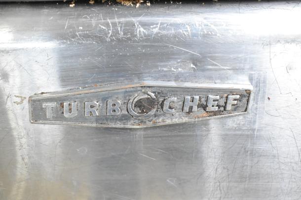 Turbochef HhC2020 commercial conveyor oven plate, visible wear, 208/240V, 3-phase, electric-powered, rapid cook feature.