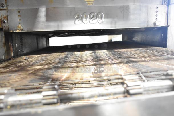 Turbochef HhC2020 commercial conveyor rapid cook oven, stainless steel, model number "2020" visible, used condition.