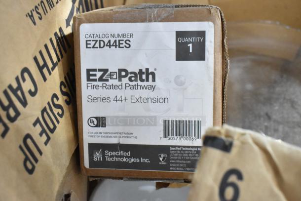 Box labeled EZ Path Fire-Rated Pathway, Series 44+ Extension, catalog number EZD44ES, by Specified Technologies Inc.