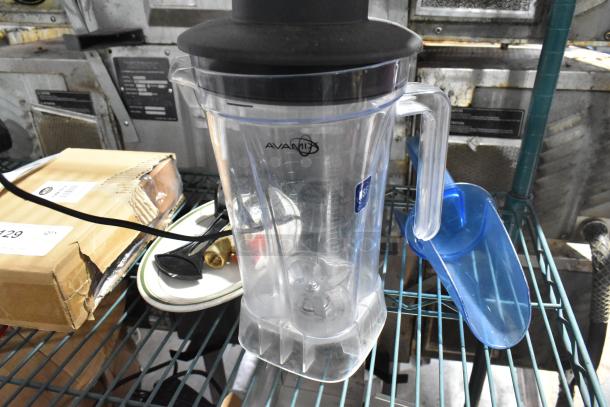 Lot includes Avamix poly blender pitcher, blue ice scooper, and TableCraft CRATE14 display crate. Used condition.