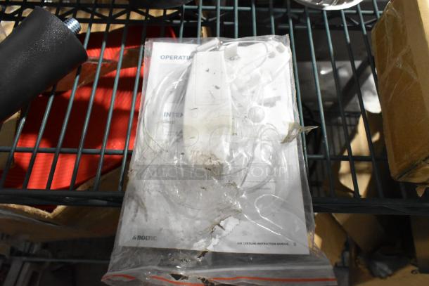 Lot of items including a poly blender pitcher, ice scooper, and TableCraft CRATE14 crate. Visible manual with "Boltic" branding.