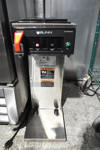 Brand new 2025 Bunn CWTF15-APS coffee machine, countertop model, 120V, with scratch and dent. Warning labels visible.