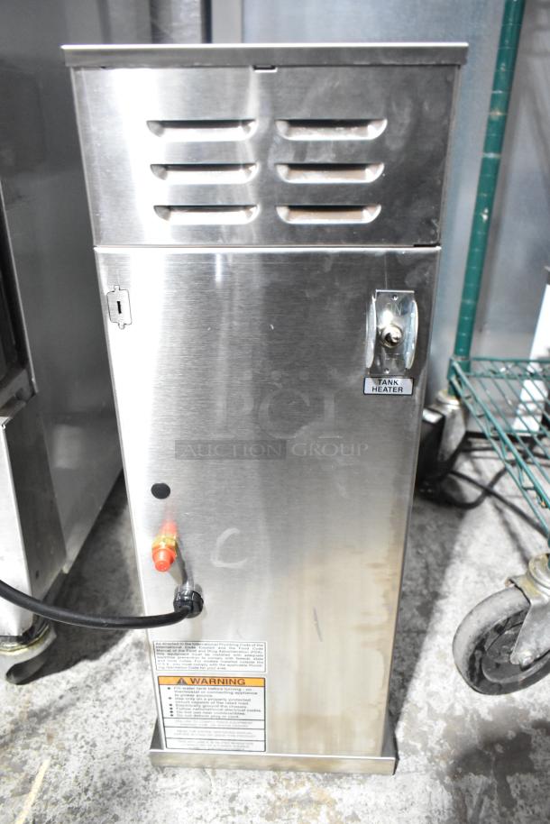 BRAND NEW Bunn CWTF15-APS Coffee Machine, scratch and dent, 120V, 1 Phase. Stainless steel, with warning label and tank heater switch.