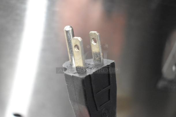 Power plug detail of a 2025 Bunn CWTF15-APS Coffee Machine, 120 Volts, 1 Phase. Brand new, with scratch and dent condition.