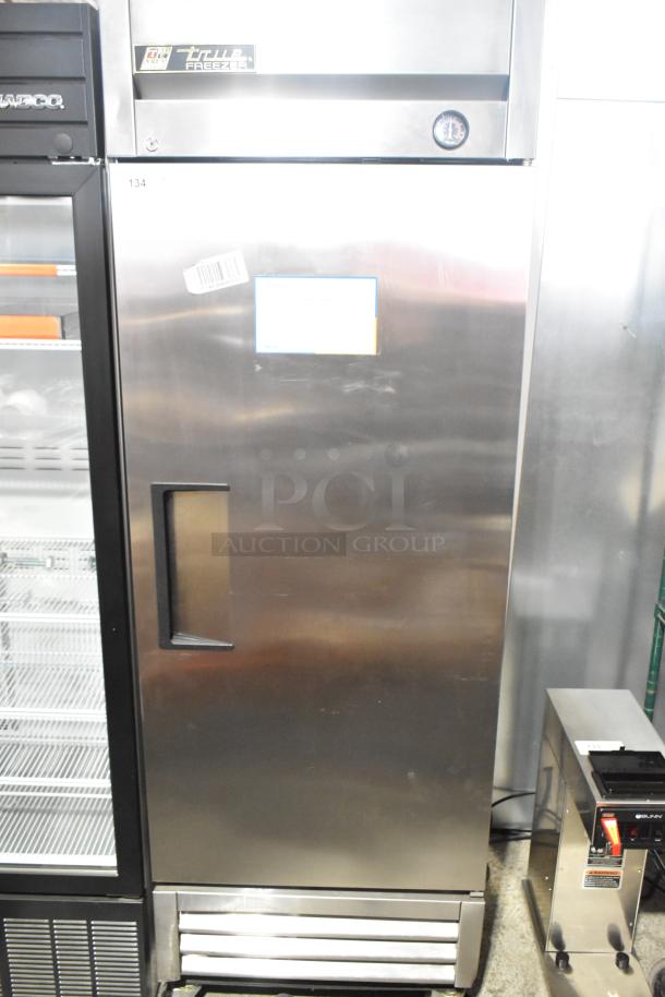 2016 True T-19F single door commercial freezer on casters, stainless steel, 115V, 1 phase, with door handle and control panel.