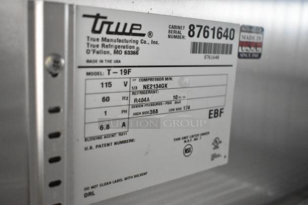 2016 True T-19F Commercial Freezer label showing model, voltage, phase, and refrigerant details. Serial 8761640.