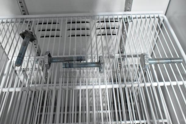 Habco SE18 Commercial Cooler interior with wire shelving and bolts. Model SE18, 115V, 1 Phase.