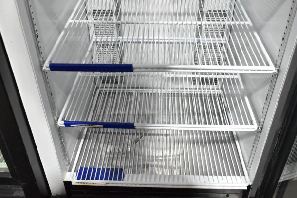 Habco SE18 Commercial Single Door Reach In Cooler Merchandiser, interior view with wire shelving, 115 Volts, 1 Phase.