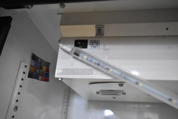 2022 True GDM-41SL-54-HC-LD cooler interior, showing LED light, switch, and color-coded wiring chart. 115 Volts, 1 Phase.