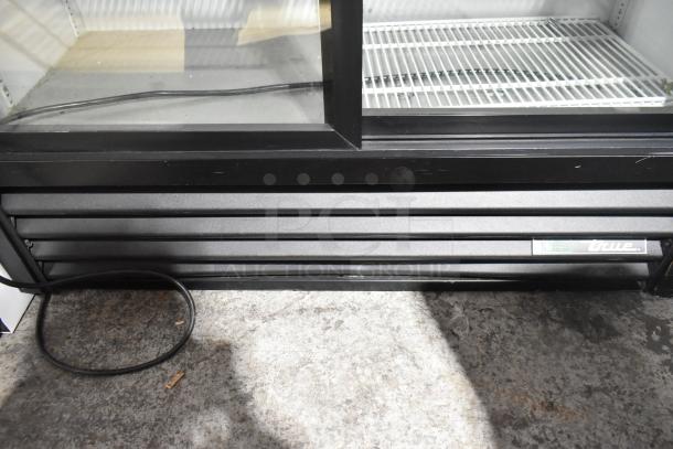 2022 True GDM-41SL-54-HC-LD cooler, 2-door, black exterior, clean shelves, 115V, 1 phase, True logo visible.