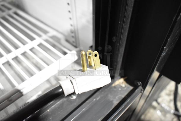 2022 True GDM-41SL-54-HC-LD cooler plug and interior shelf detail, 115V, 1 phase, commercial cooler.