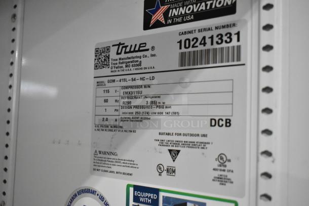 2022 True GDM-41SL-54-HC-LD cooler label showing model, voltage, and refrigerant details. Serial 10241331.