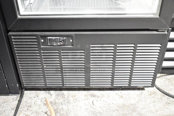 Habco SE18 commercial cooler, single door, reach-in model, 115 volts, 1 phase. Black exterior, grid panel, visible temperature control.