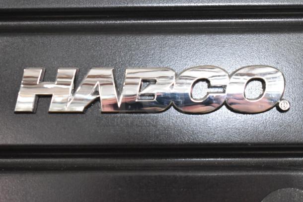Habco SE18 cooler merchandiser logo on black surface. 115 volts, 1 phase.