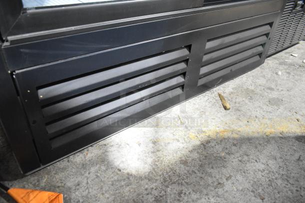 QBD CD4154-HC Commercial 2 Door Cooler Merchandiser, 115 Volts, 1 Phase. Vented black front panel, slight wear.