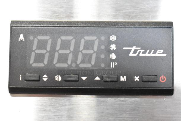 Digital control panel of True T-19F-HC freezer displaying temperature settings and brand logo.