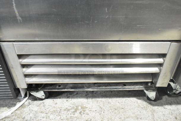 2021 True T-19F-HC commercial single door freezer, stainless steel, 115 volts, 1 phase, on casters, showing lower ventilation.