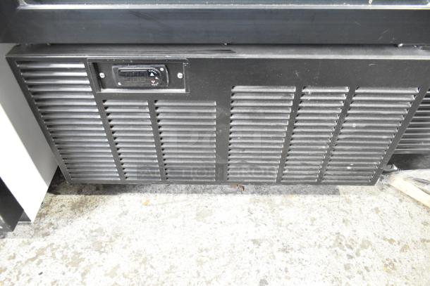2019 Habco SE18 commercial cooler, single door, reach-in, 115V, 1 phase, black vent panel, digital display, good condition.