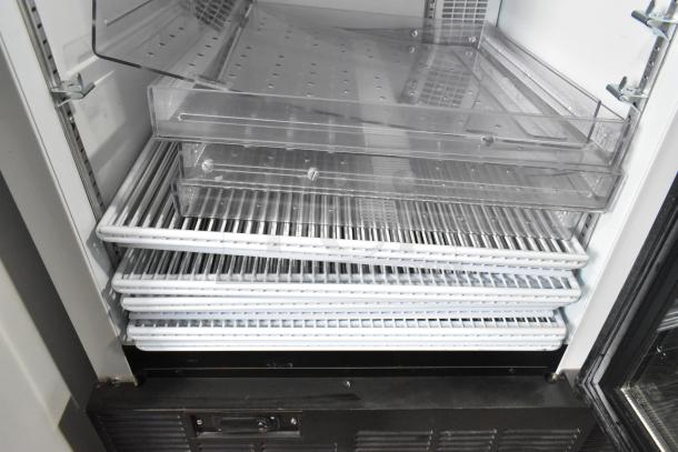 2019 Habco SE18 Commercial Single Door Cooler Interior, with adjustable wire racks and clear plastic shelves.