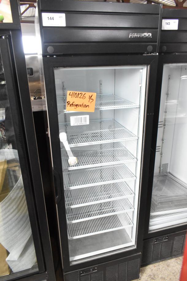 2019 Habco SE18 commercial cooler, single door, 115V, black. Includes 5 shelves. Model SE18 tag visible. Good condition.