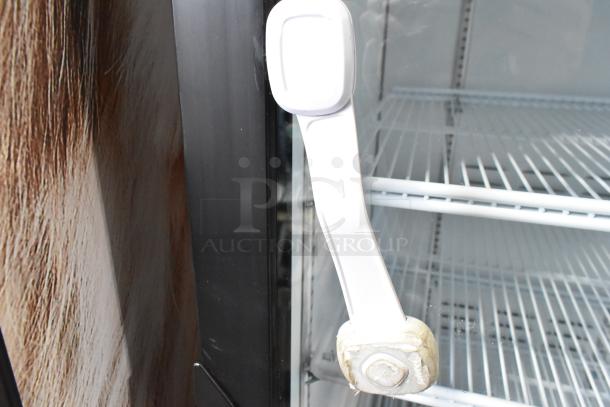 2019 Habco SE18 commercial single door cooler with glass handle, white wire shelves, 115V, 1 phase, shows signs of wear.