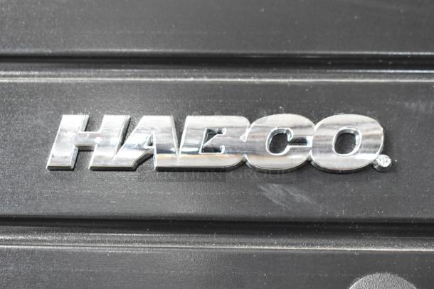 2019 Habco SE18 commercial single door reach-in cooler, 115 volts, 1 phase. Silver Habco logo on black surface.