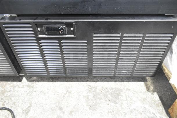 2019 Habco SE18 commercial reach-in cooler. Single-door unit, black with display panel. 115V, 1 phase. Appears in used condition.
