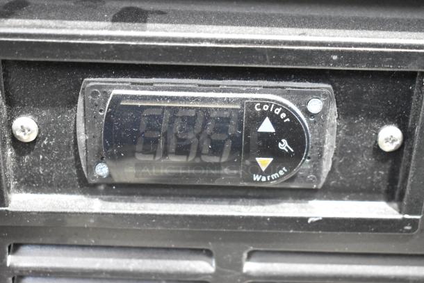 2019 Habco SE18 cooler thermostat display with temperature control buttons, indicating colder and warmer settings.