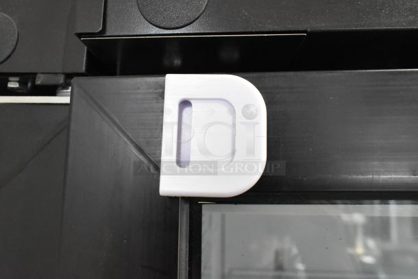 2019 Habco SE18 cooler door corner detail showing black frame and white hinge. 115V, 1-phase commercial model.