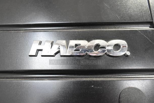 2019 Habco SE18 commercial cooler logo detail on black surface, showcasing brand authenticity.