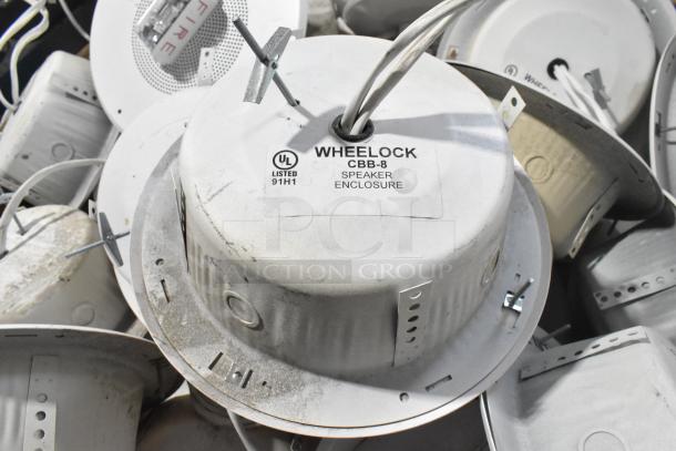 80 Wheelock CBB-8 speakers, UL listed, used condition; visible mounting brackets and wiring, labeled "Speaker Enclosure."