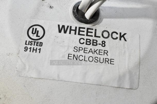 Wheelock CBB-8 speaker enclosure label with UL listing 91H1, indicating product compliance and safety standards.