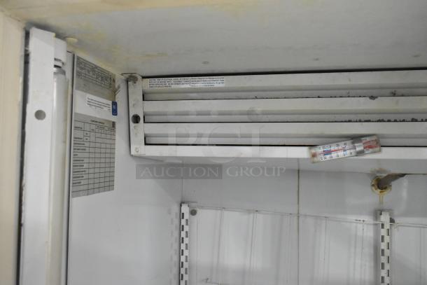 Kelvinator Commercial 2 Door Merchandiser interior. Includes shelving, visible temperature gauge, and condition notes.