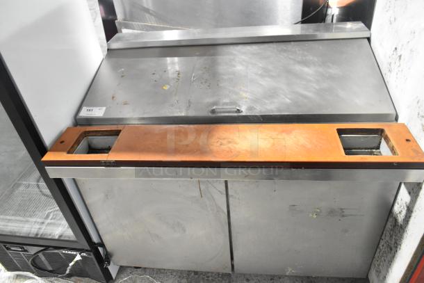 Continental SW48-18M commercial sandwich prep table with mega top, bain marie, and casters. Visible wear on surface.