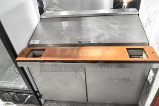 Continental SW48-18M commercial sandwich prep table with mega top, bain marie, and casters. Visible wear on surface.