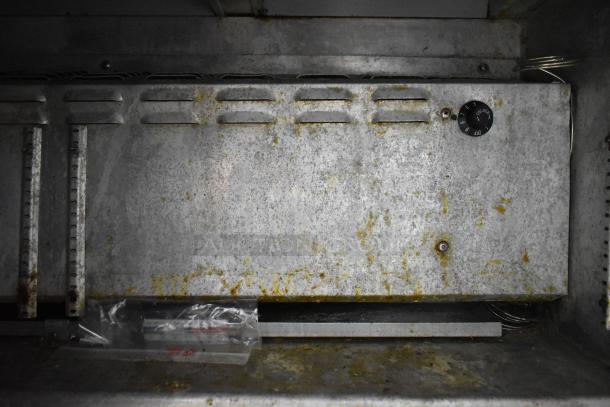 Continental SW48-18M prep table interior showing thermostat dial, slightly worn and needs cleaning. 115V, 1 phase.