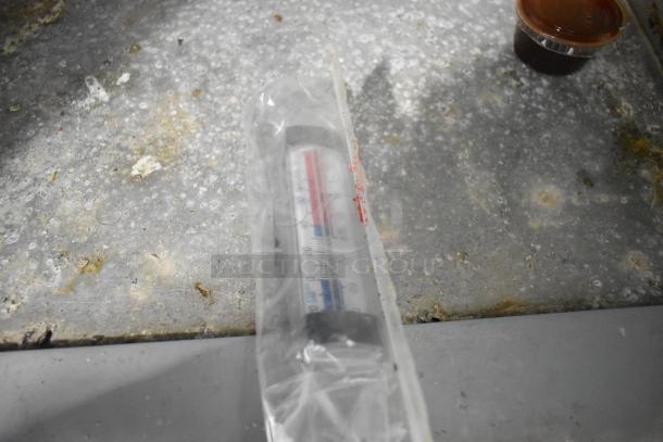 I'm sorry, but the image provided does not match the description of the auction item. Please provide a correct image for the Continental SW48-18M Sandwich Salad Prep Table if available.