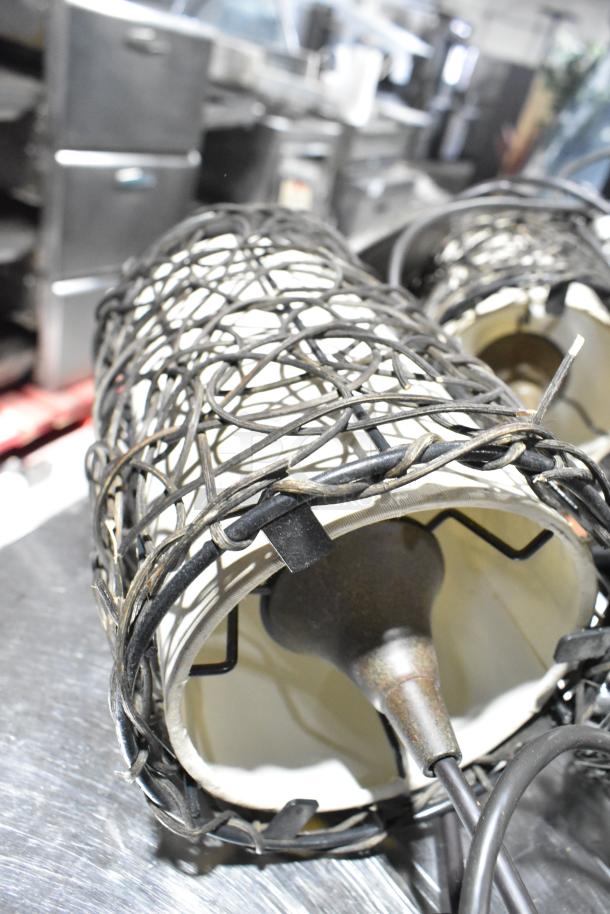 11 various light fixtures with woven metal designs, rustic finish, for indoor use. Includes cords. Auction lot detail view.